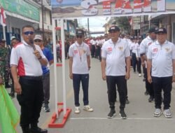 Bupati-Wakil Bupati Aru Ikut Lomba Baris Indah Menyongsong HUT RI Ke-80
