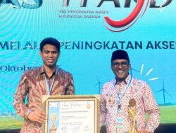 Percepat Inklusi Keuangan, Bupati Malteng Terima Penghargaan dari Arilangga Hartanto